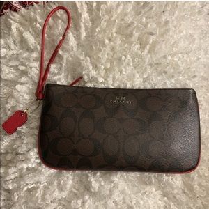 Dark Brown and Cherry Red Coach Wristlet
